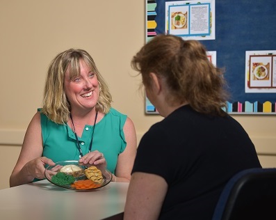 Woman meeting with a diabetes counselor
